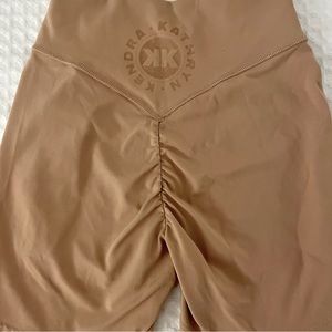 KK Fit Gymshark Scrunch Bum shorts. Color warm nude. Never wore. Size XS